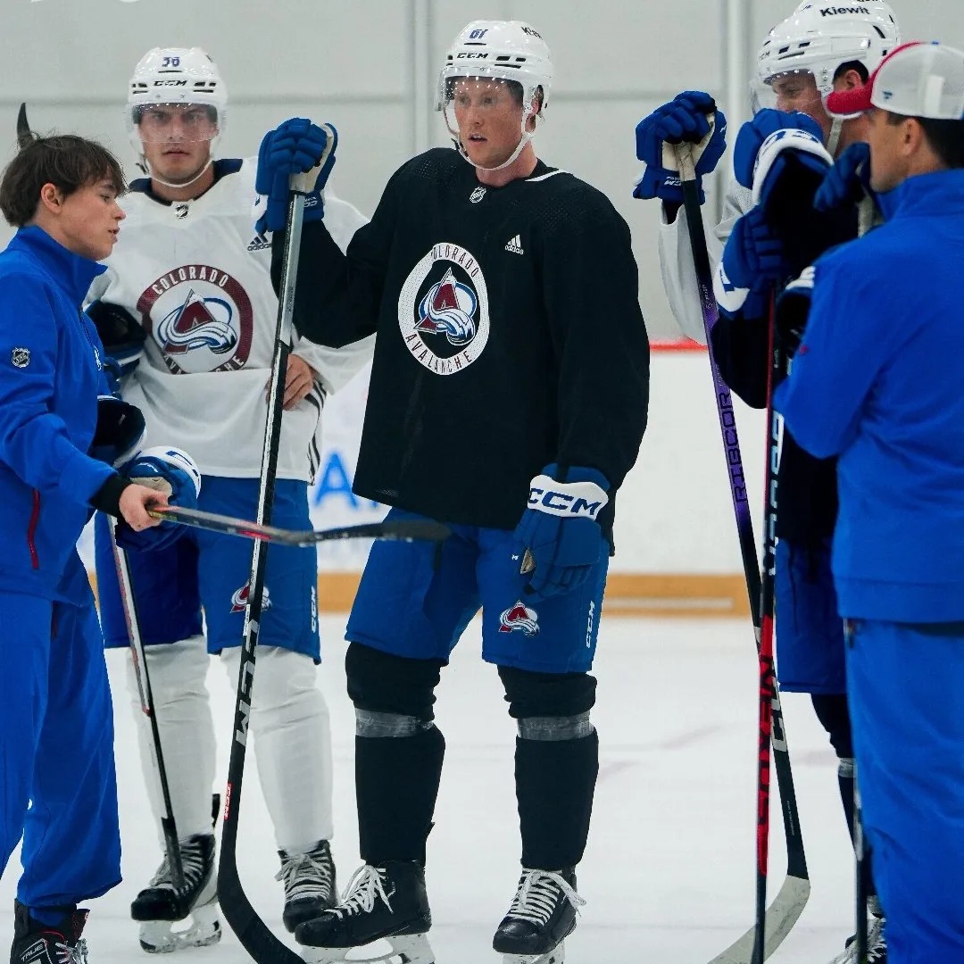 Coaching on the ice in Denver